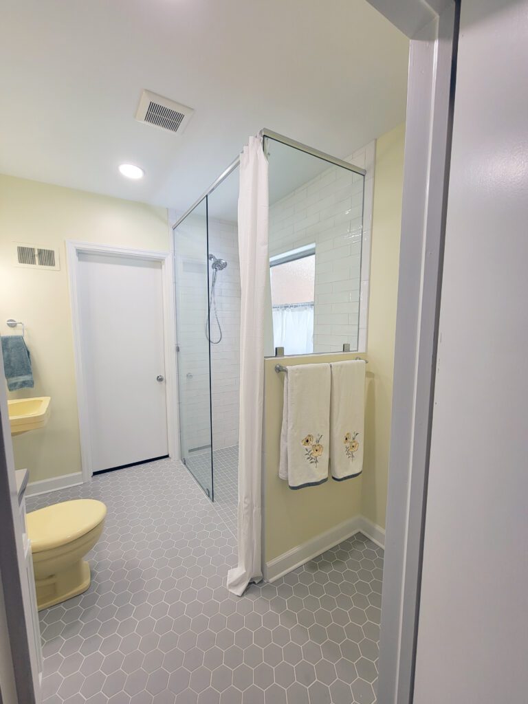 Accessible bathroom with curbless shower